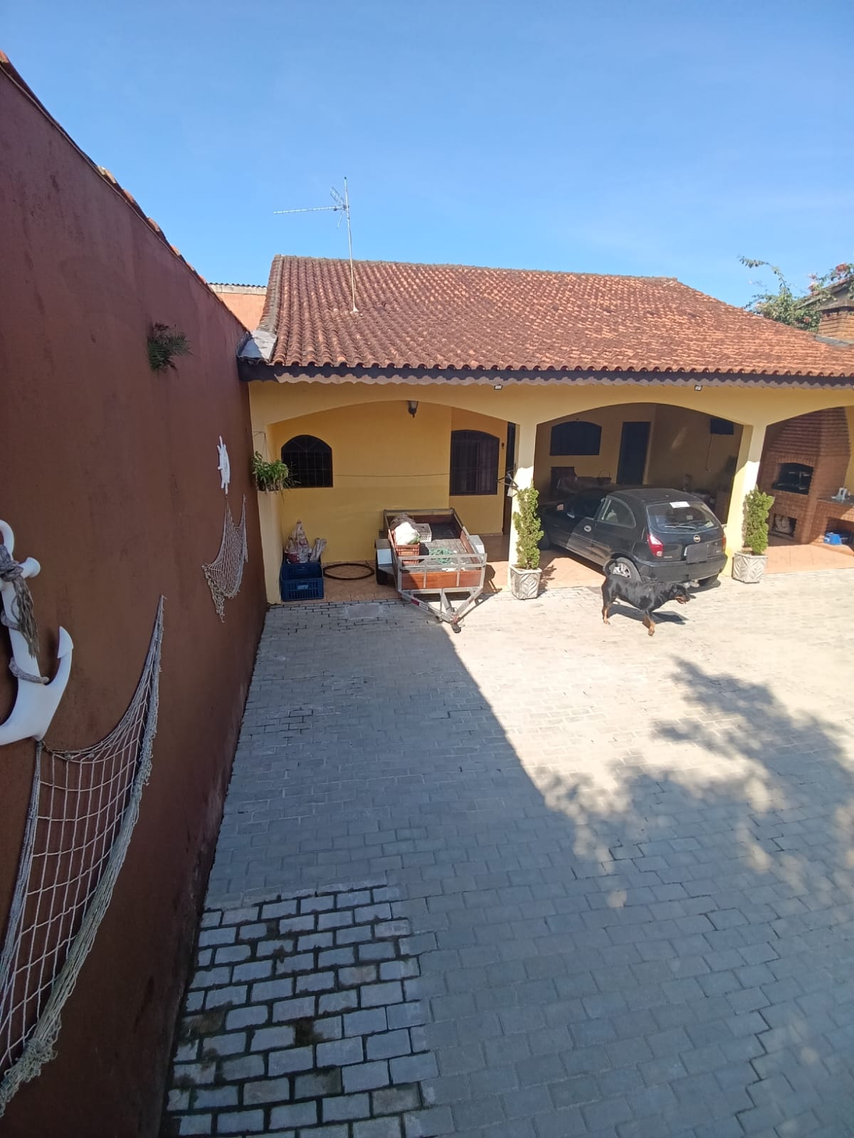 Espaço Sem Limites! Casa com Suíte Reversível, Área Gourmet e 10 Vagas em Itanhaém.