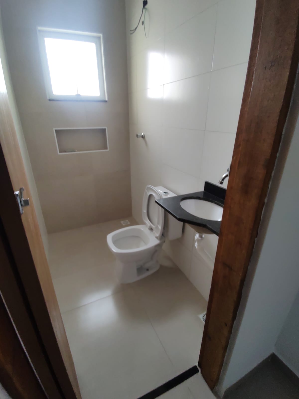 CAS261326 Casa em Itanhaém com 2 suítes e piscina com cascata financiada