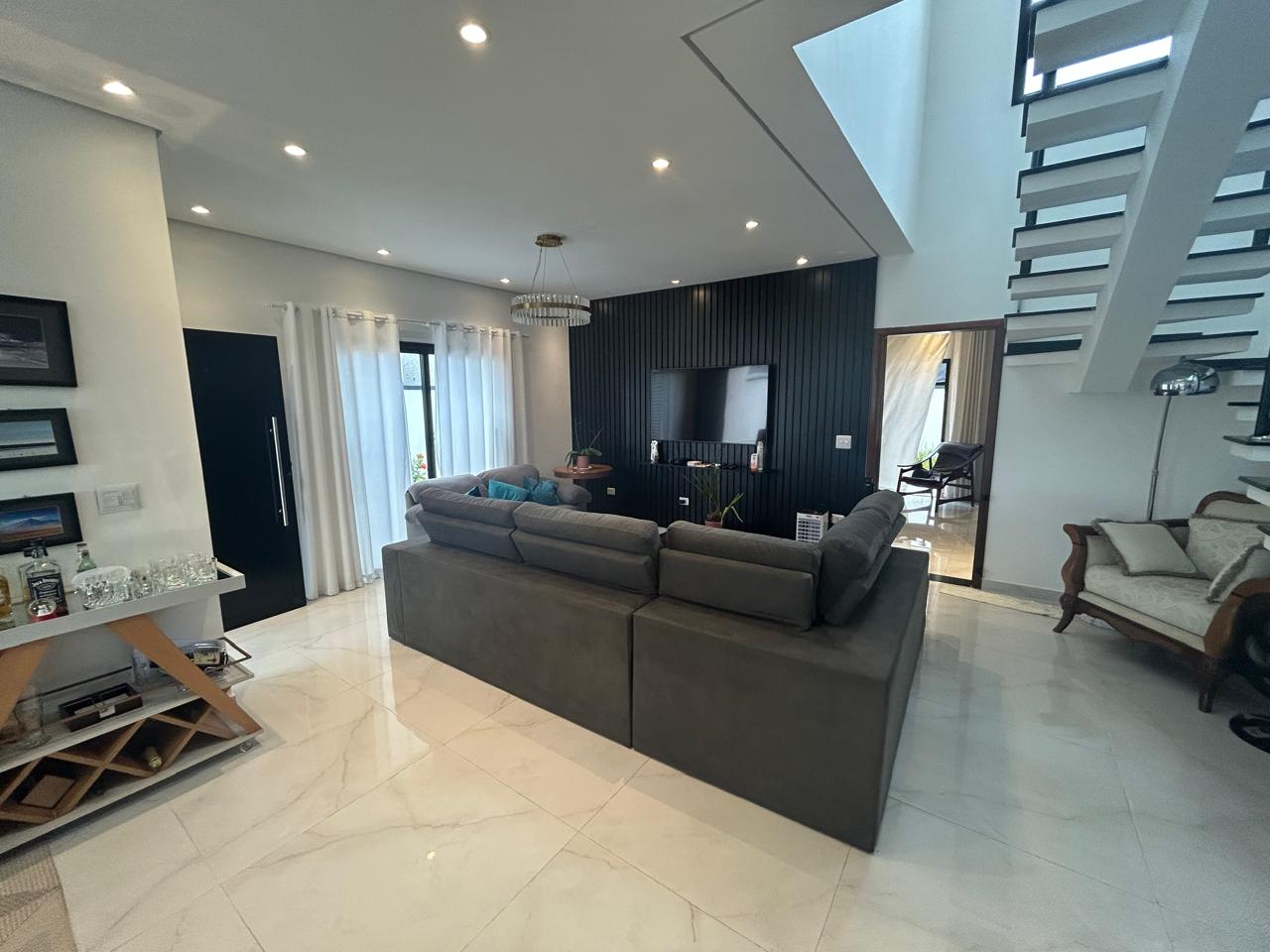 CAS261316 Sobrado no Condomínio Flora Rica Peruíbe com 4 suítes e piscina