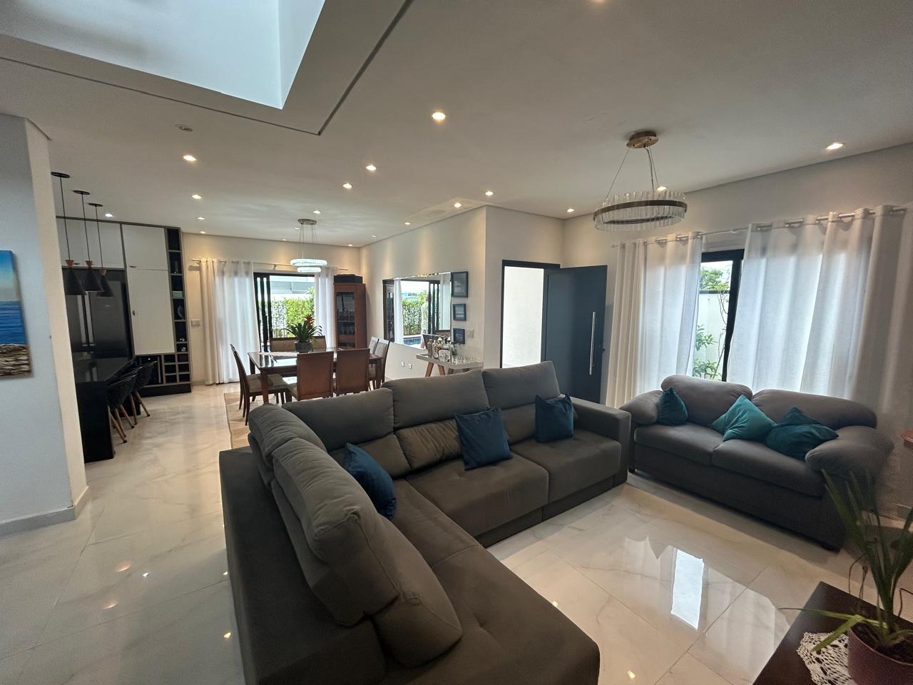 CAS261316 Sobrado no Condomínio Flora Rica Peruíbe com 4 suítes e piscina