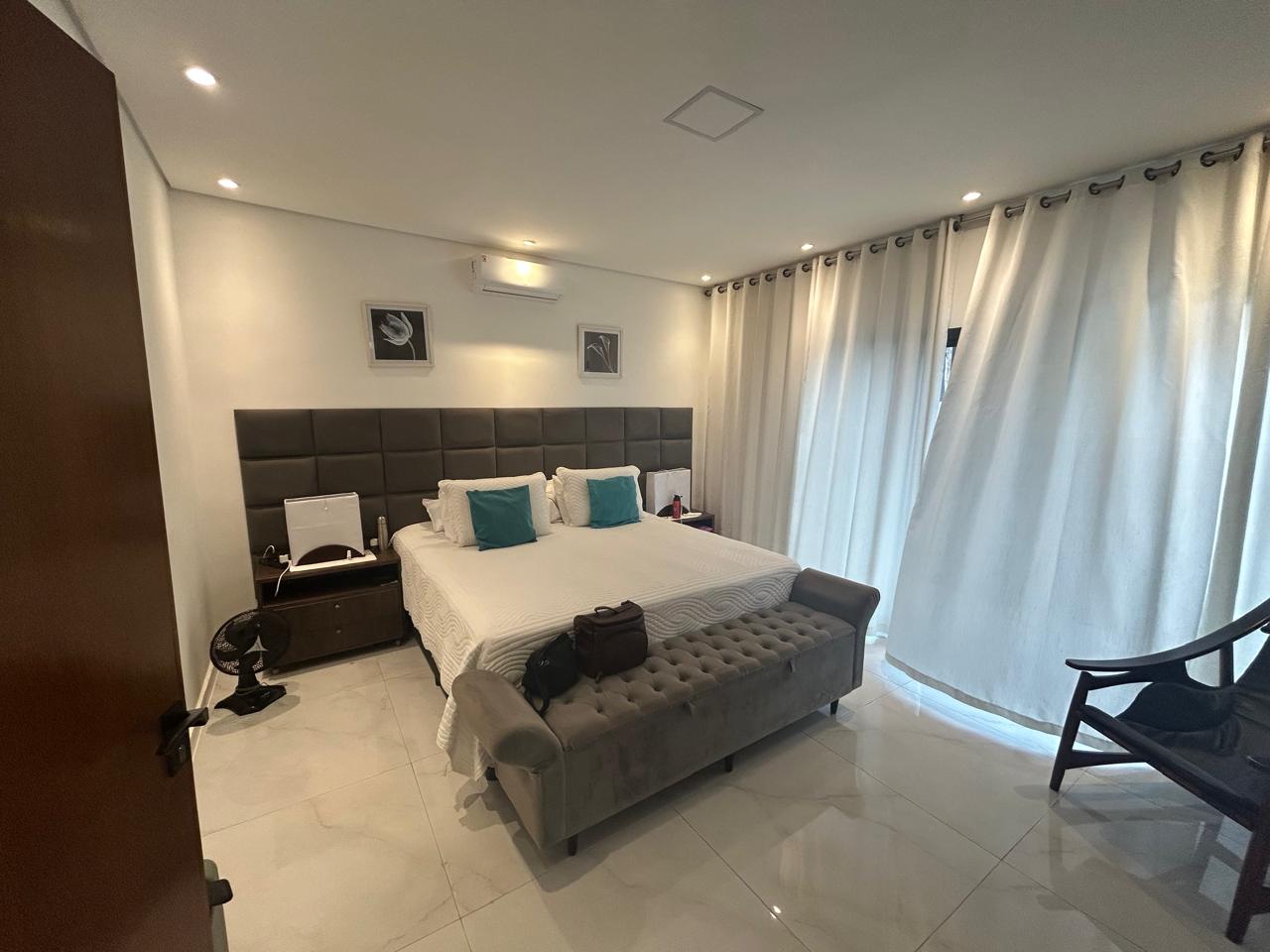 CAS261316 Sobrado no Condomínio Flora Rica Peruíbe com 4 suítes e piscina