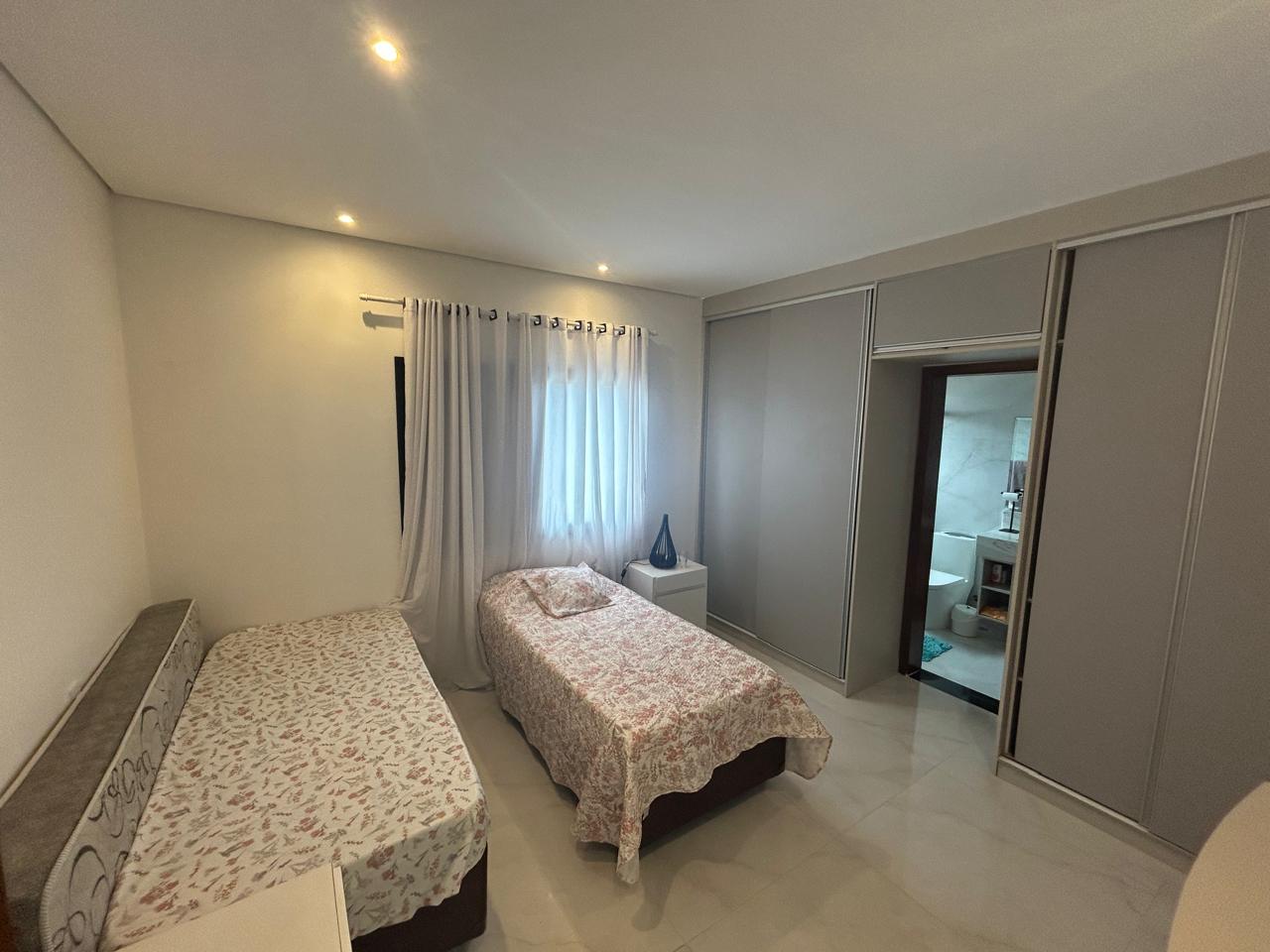 CAS261316 Sobrado no Condomínio Flora Rica Peruíbe com 4 suítes e piscina